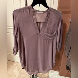Silky, long tunic, like button down shirts.